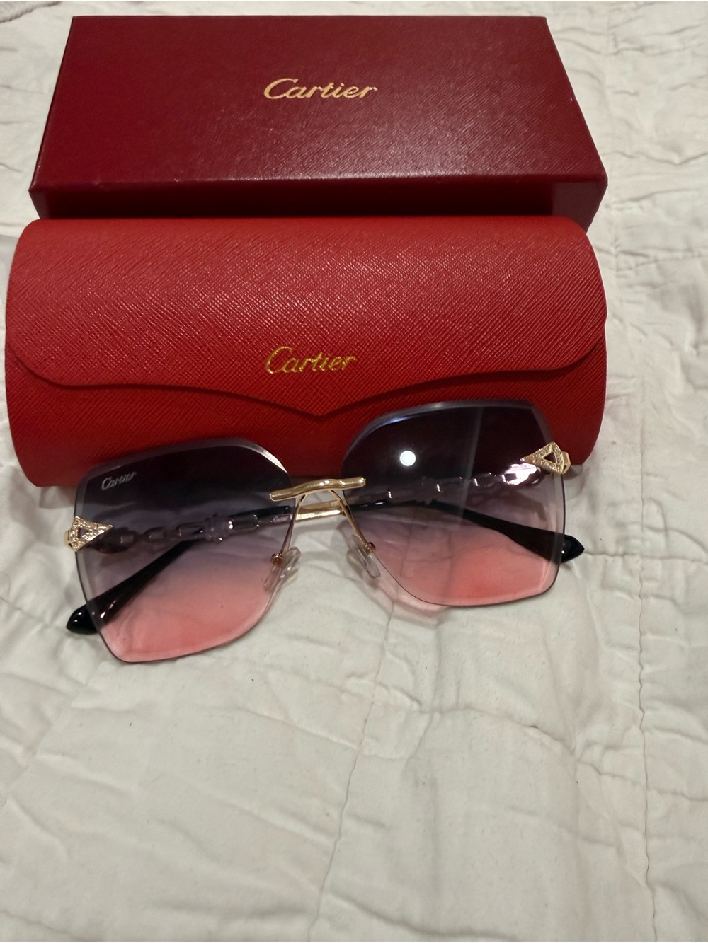 Cartier Women's Pink Gradient Lens Sunglasses with Gold Detailing